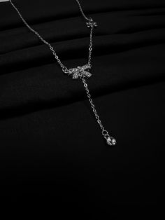 The necklace features a durable and lightweight chain that sits comfortably around the neck and a stunning pendant that catches the light with its sparkling finish. The pendant is embellished with a cluster of shimmering crystals that add a touch of elegance and glamour to the design. This necklace is versatile and suitable for both casual and formal occasions, making it a must-have accessory in any jewelry collection. It makes for a great gift for yourself or your loved ones who appreciate minimalist yet stylish designs. Wedding Jewellery Necklace, Stainless Steel Necklace, Wedding Necklace, Wedding Jewelry, Necklace Etsy, Jewelry Collection, Sparkle, Great Gifts, Stainless Steel