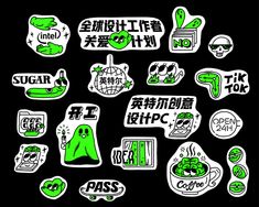 various stickers are arranged on a black background, including green and white letters that spell out the word