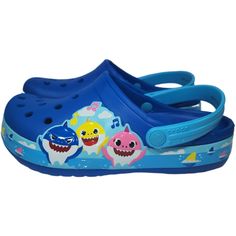 - Crocs Funlab Baby Shark Kids Clogs - Color: Blue - Material: Rubber - Style # 206704-4jl Cute Blue Non-slip Clogs, Blue Playful Round Toe Sandals, Playful Blue Round Toe Sandals, Playful Blue Round Toe Clogs, Blue Non-slip Clogs For Summer, Blue Non-slip Clogs With Round Toe, Blue Non-slip Synthetic Clogs, Light Blue Non-slip Slip-on Clogs, Blue Fun Slip-on Clogs