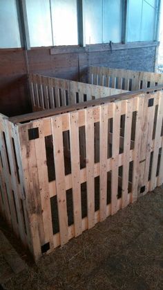 a wooden crate sitting on top of hay