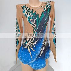 a woman's gymnastics leotard with blue and gold designs on it,