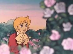 an animated image of a young man standing in front of flowers with his hand on his chest