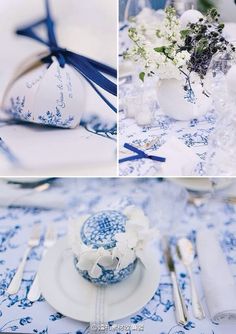 the table is set with blue and white dishes, silverware, and napkins