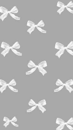 white bows on grey background for wallpaper