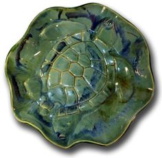 a green plate with a turtle on it