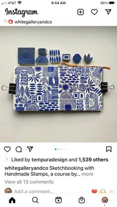 a blue and white bag with different items in it on top of an instagram page