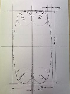 a drawing of an oval object on top of a sheet of paper with measurements for each section