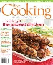 the cover of the cooking magazine shows chicken skewers on a plate with green beans