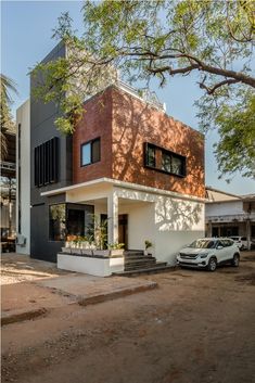 a car is parked in front of a house