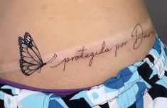 a woman's stomach with a butterfly tattoo that reads, patiegada por juan