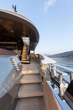 stairs leading up to the upper deck of a boat