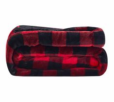 the red and black buffalo plaid blanket is folded up on top of it's back