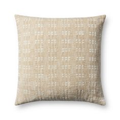 a beige pillow with white squares on the front and back, sitting on a white background