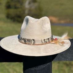 Faux Felt  Brim is 3 1/2" AdultSMLXL American:6 3/46 7/877 1/87 1/47 3/87 1/27 5/8 Inches21 1/221 7/822 1/422 5/82323 3/823 3/424 Centimeters:5455565758596061 Winter Adjustable Fedora With Feathers, Winter Fedora With Feathers And Adjustable Fit, Western Cream Hat For Fall, Adjustable Fedora Costume Hats For Fall, Adjustable Felt Hat With Feathers For Winter, Winter Adjustable Felt Hat With Feathers, Adjustable Winter Felt Hat With Feathers, Adjustable Cream Fedora For Festivals, Adjustable Wide Brim Hat With Feathers