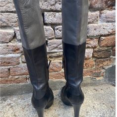 Knee Length Tall Fendi Boots. Very Stylish Size 9. Black/Grey Color. Elegant Gray Round Toe Boots, Elegant Fitted Gray Boots, Gray Leather Boots With Reinforced Heel, Chic Gray Leather Boots, Gray Leather Boots Medium Width, Fendi Boots, Grey Leather Boots, Fendi Shoes, Grey Color