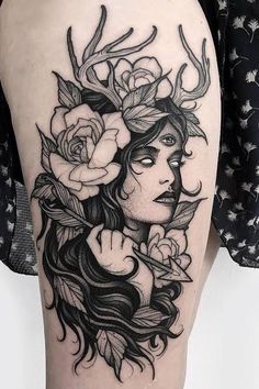 a woman with flowers on her head is shown in black and white tattoo art by person