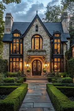 Elegant stone house with warm, glowing lights. Check out the whimsical wonders of big houses where vastness meets imagination, transforming envy into inspiration! Modern House With Character, Luxury Home Must Haves, Big Houses Mansions, Castle Homes, Stone Homes, Nice Houses, Home Exteriors, 6 Bedroom House, Suburban House