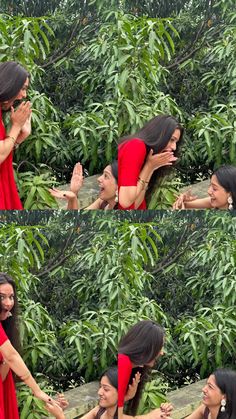 a woman in a red dress holding her hands out to another woman who is covering her face