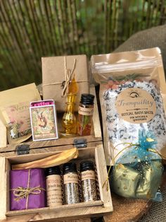 an assortment of items are displayed on a wooden tray in front of a bamboo background