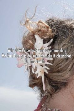 a close up of a person with a hair piece in their hair and the words, why does interest keep recommending me christianians do i need to make it clear that?