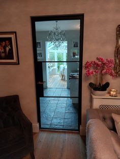 an open door leading into a living room