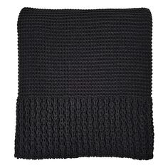 a black knitted blanket on a white background