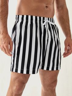 Our Striped Pattern Drawstring Waist Swim Shorts are perfect for stylish summer wear. Featuring a stylish striped pattern, these shorts offer a fashionable and lively look. An adjustable drawstring waist ensures a snug and secure fit, providing you with distraction-free comfort while swimming. Details: Pattern Type: Striped Details: Drawstring, Pocket Type: Bottoms Bottom Type: Shorts Fabric: Slight Stretch Composition: 100% Polyester Care Instructions: Machine wash, do not dry clean, wash with Sporty Striped Swim Trunks For Summer, Striped Drawstring Bottoms For Beach, Striped Beach Bottoms With Drawstring, Trendy Striped Shorts With Built-in Shorts, Striped Shorts For Summer, Striped Bottoms With Built-in Shorts For Poolside, Striped Short Beachwear Swim Trunks, Striped Cotton Swim Trunks For Beach, Summer Striped Tie-side Bottoms