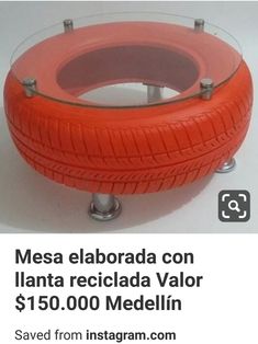 an orange tire sitting on top of a metal stand next to a white background with the words mesa elaborada con llantata recclada valor $ 150 00 medelin