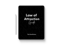 the law of attraction guide on a white background with a pen in front of it