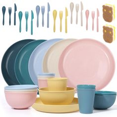 there are many different colored plates and cups