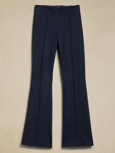 This flare-leg pant is designed for comfort, cut from our Everywhere Ponte fabric.   We developed this special Ponte de Roma, enhancing its softness with special stretch fibers that create a smooth, supportive fit that always looks polished.   4-way Stretch Flare Fit: High-rise (10").  Slim through the hip and thigh with a flared leg.  Full length.  Sustainability: Made with Birla Livaeco™ viscose, a fiber derived from renewable wood resources and sourced from responsibly managed forests.  Birla Livaeco™ viscose is manufactured using a stringent closed-loop process that significantly reduces carbon emissions and water consumption as compared to generic viscose.  Pull-on design with concealed elastic at the waist.  No pockets.  Pin-tuck stitch detail creates the look of a trouser crease.  U Ponte Pants, Family Event, Flare Leg Pants, Pin Tucks, New Woman, Banana Republic, Full Length, High Rise, Navy Blue