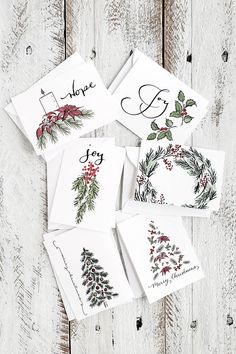 four christmas cards with the words hope, joy, joy and holly written on them