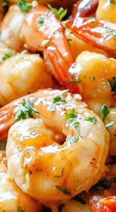 closeup of cooked shrimp with parsley on top