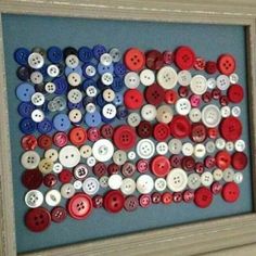 an american flag made out of buttons in a frame