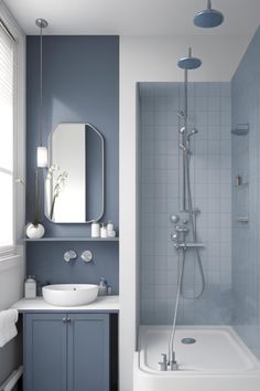 a bathroom with blue walls and white fixtures, including a bathtub in the corner