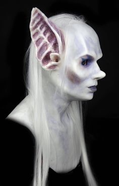 "ABOUT Silicone Mask \"Dark Elf Queen\": ➤ Features * This \"Dark Elf Queen\" mask is a wonderful thing to have! Terrifically realistic and wearable for hours. * This mask can be used on stage, as well as for movies, other artistic projects, or simply for treating your friends to an absolutely unforgettable experience! * Made from silicone with a mesh-protected layer. * Perfect condition, never used! * Comes with a mannequin stand to maintain the mask's shape and quality over time; $80 value --- Fantasy White Masks And Prosthetics For Halloween, White Fantasy Masks And Prosthetics For Halloween, Purple Halloween Mask And Prosthetics, Dark Elf Queen, Human Mask, Elf Queen, World's Strongest Man, Custom Mask, Silicone Mask