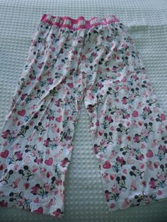 Girl's Size Large Disney Mickey & Minnie Hearts & Soda Pajama PJ Pants Fine condition girls size large pajama pants with a wide elastic waist band  with Mickey & Minnie in white . Decorated with  the mouse lovers , hearts,  and ice cream sodas. The inseam measures 20 1/2 inches. Adorable. 100% cotton. Perfect for bed or lounging. Shipping and handling is only $4.99. Cream Soda, Pj Pants, Mickey Minnie, Disney Mickey, Waist Band, Pajama Pants, Elastic Waist, Ice Cream, Elastic