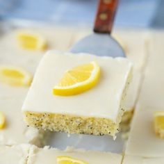 there is a piece of cake with lemons on it