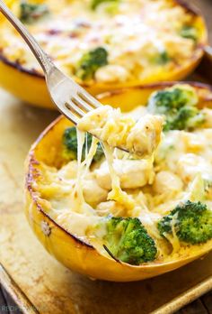 a fork is lifting up some food out of the casserole dish with broccoli