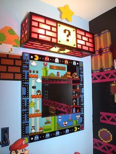 a nintendo themed bedroom with mario's mirror and other items on the wall above it