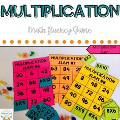 a pile of multiplication math flueny game with numbers and letters on it