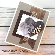 a close up of a card with two hearts