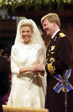 the prince and princess are smiling as they stand next to each other in front of an audience