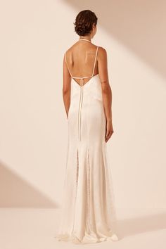 With a floor-sweeping silhouette and halter neck tie, the La Lune Silk Lace Plunged Maxi Dress is a modern approach to bridalwear. Beauty is found in the small embellishments, from contrast lace splicing to elegant bust dart details. Bust Dart, Plunge Maxi Dress, Shona Joy, Lace Splicing, Silk Lace, Ivory Dresses, Dart, Halter Neck, Neck Tie