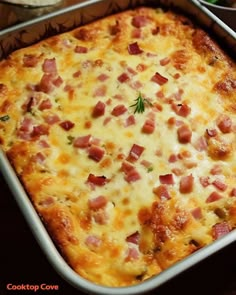 a casserole dish with ham and cheese in it