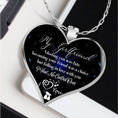 a heart shaped necklace with the words to my wife on it and an image of a butterfly