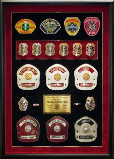 a display case with many badges on it