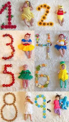 several baby dolls laying on the floor next to letters and numbers that spell out their names