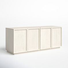 a white cabinet with four doors and three drawers on each side, in front of a plain background