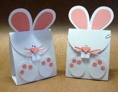 two paper bags with bunny ears on them